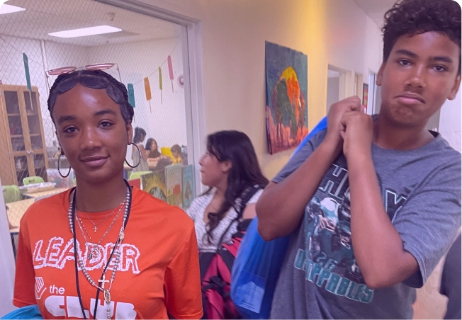Two happy teenagers attending summer camp at Los Angeles Boys and Girls Club