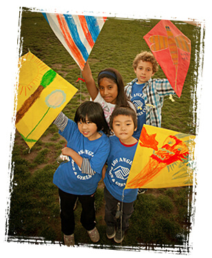 Children playing with hand-made kites at the Los Angeles Boys & Girls Club